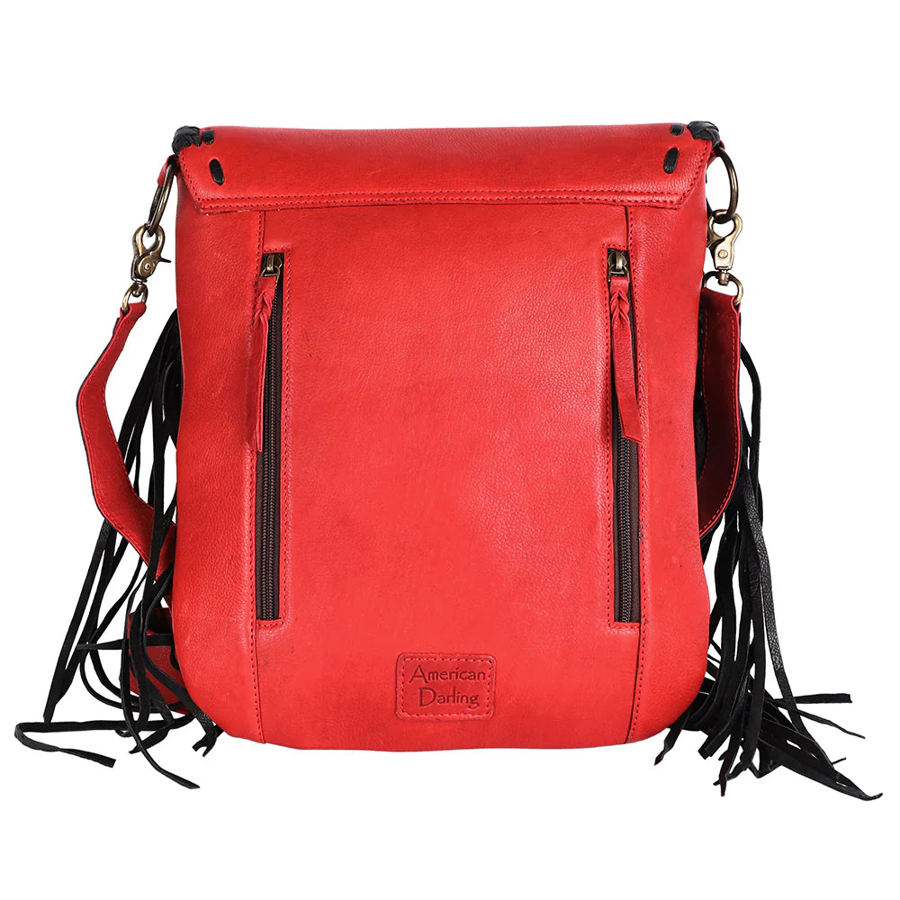 American Darling Cowgirl Statement Western Rodeo Messenger Bag. Red leather bag with black fringes on a white background