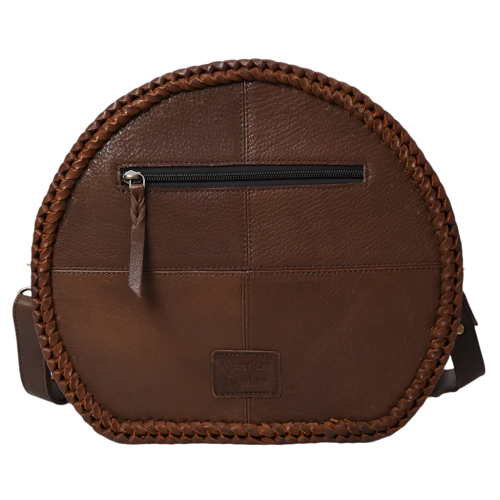 American Darling Brown leather crossbody bag with braided edge on a white background