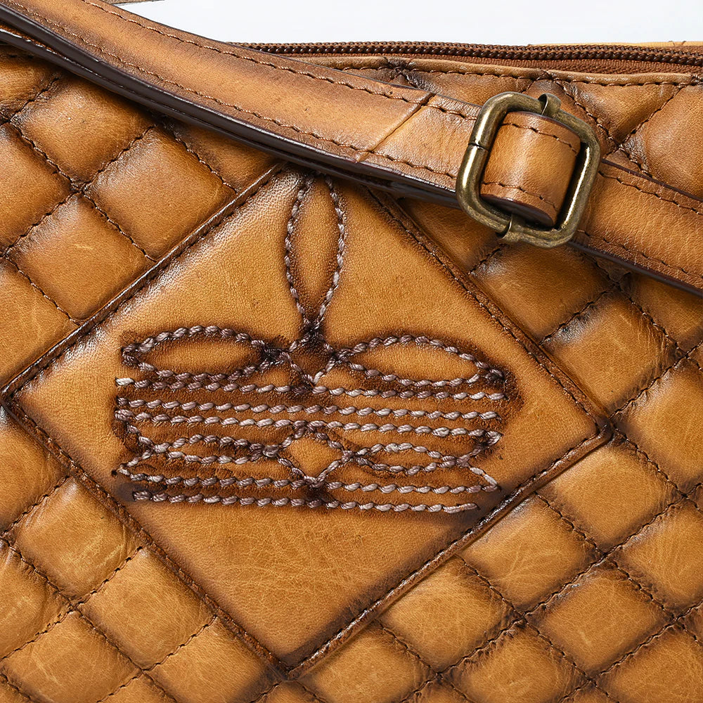 American Darling Western Stitch Quilted Tan Leather Crossbody Bag. Close-up of a brown leather handbag with a diamond pattern and gold buckle.