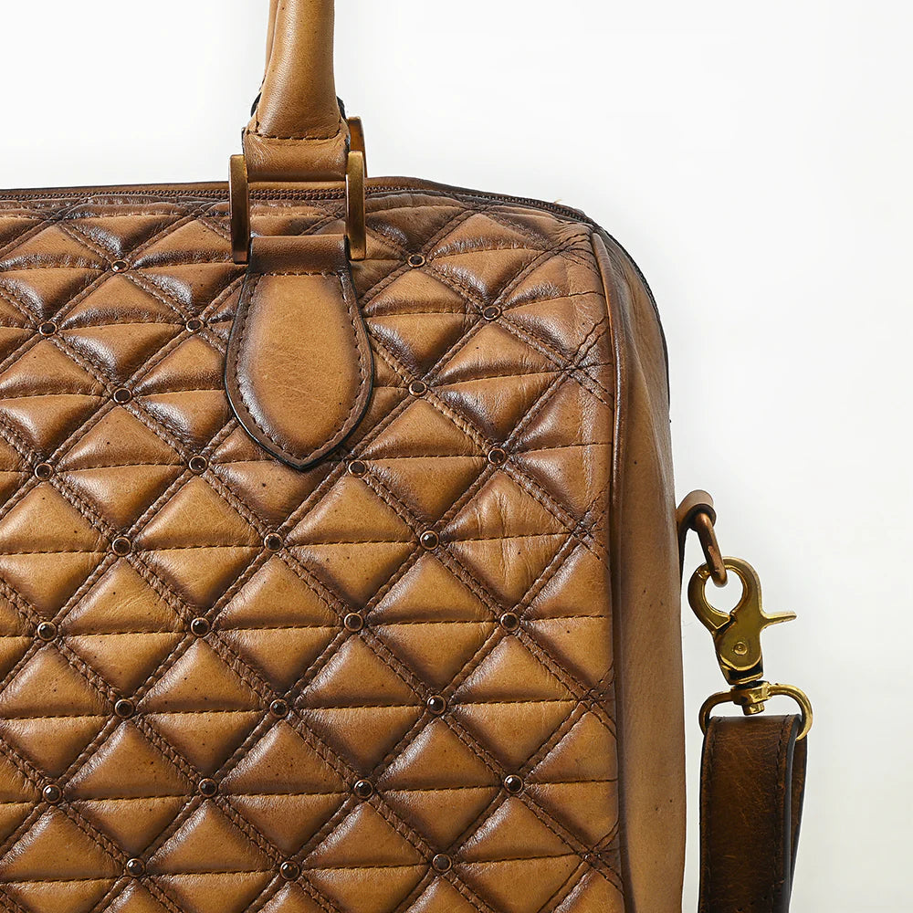 American Darling Genuine Leather Western Duffel Bag. Brown quilted handbag with a gold clasp on a white background