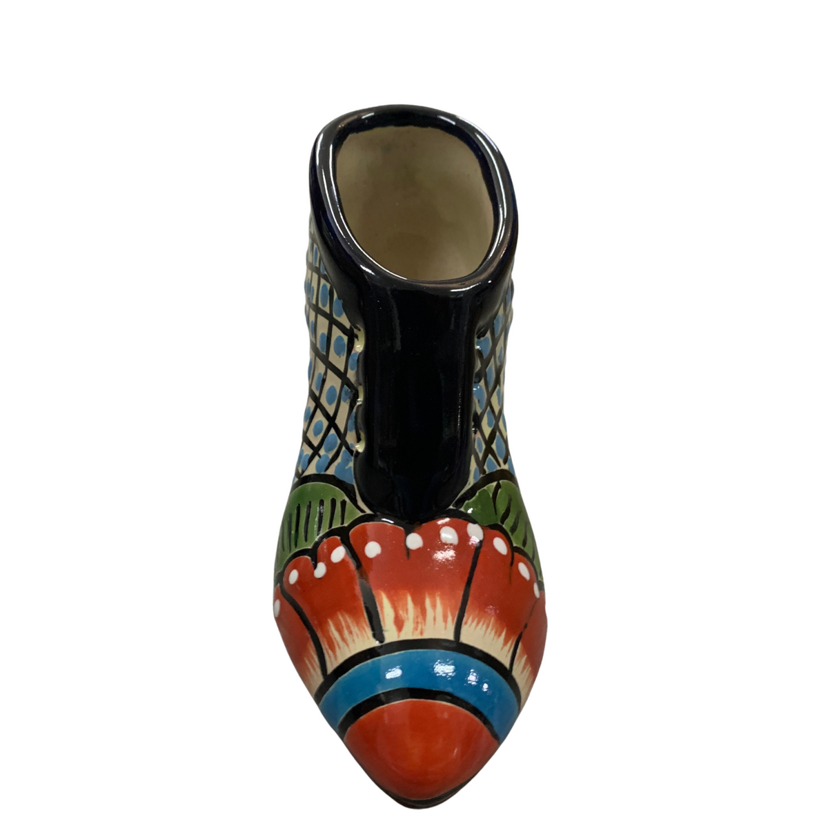 A hand-painted ceramic boot-shaped planter on a solid white background.