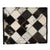 Women's Patchwork Cowhide and Tooling Leather Makeup Bag. Woman holding a checkered handbag in a garden setting