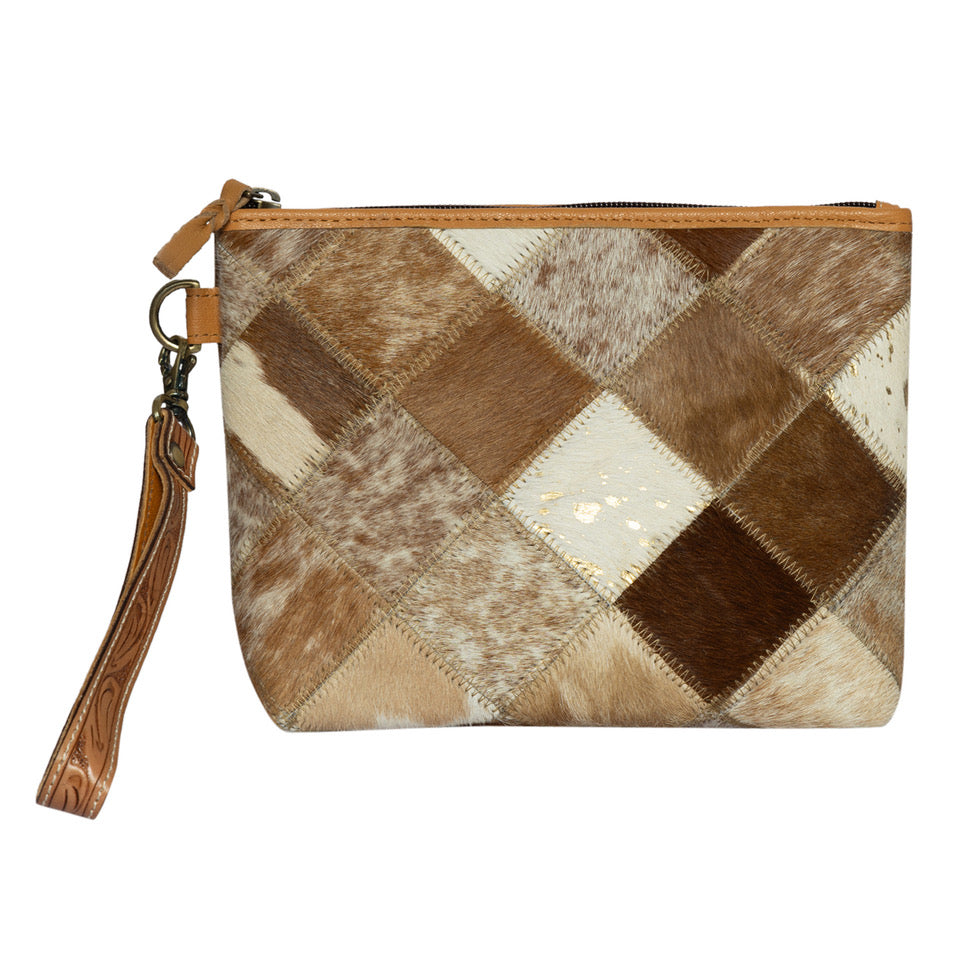 The Design Edge Women's Patchwork Cowhide Clutch. Patchwork leather clutch with brown and beige pattern on a white background