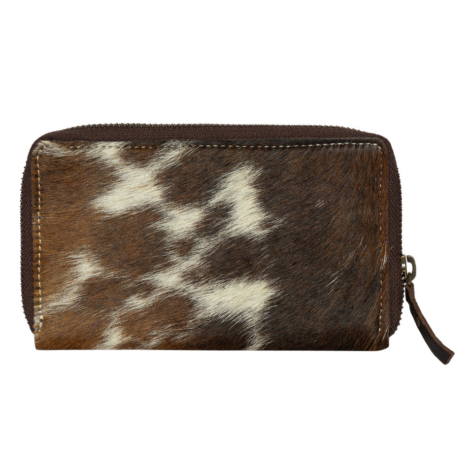 The Design Edge Women's Ronda Bullhead Wallet. Brown and white cowhide wallet on a white background
