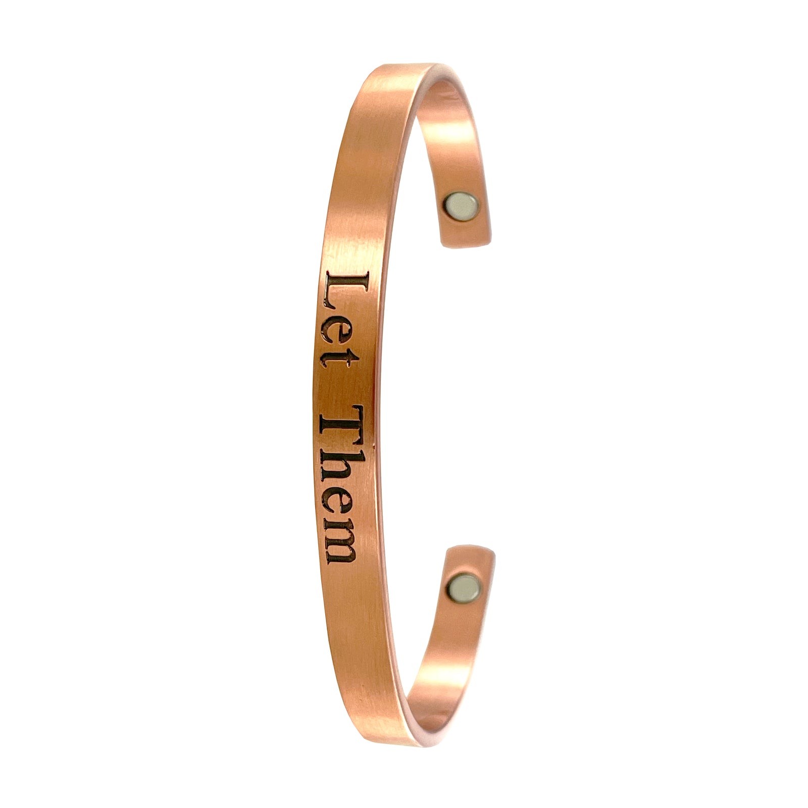 Let Them Copper Magnetic Bracelet. A copper magnetic band bracelet with the inscription 'Let Them' written in capital letters.
