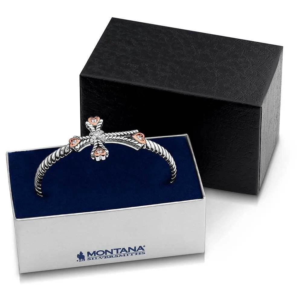 Silver bracelet with rose gold accents in a Montana Silversmiths box.