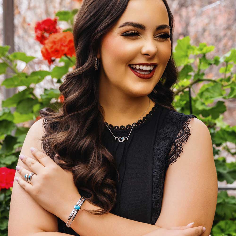 Montana Silversmith a bold crafted turquoise stone anchors the center of the silver tone cuff. 