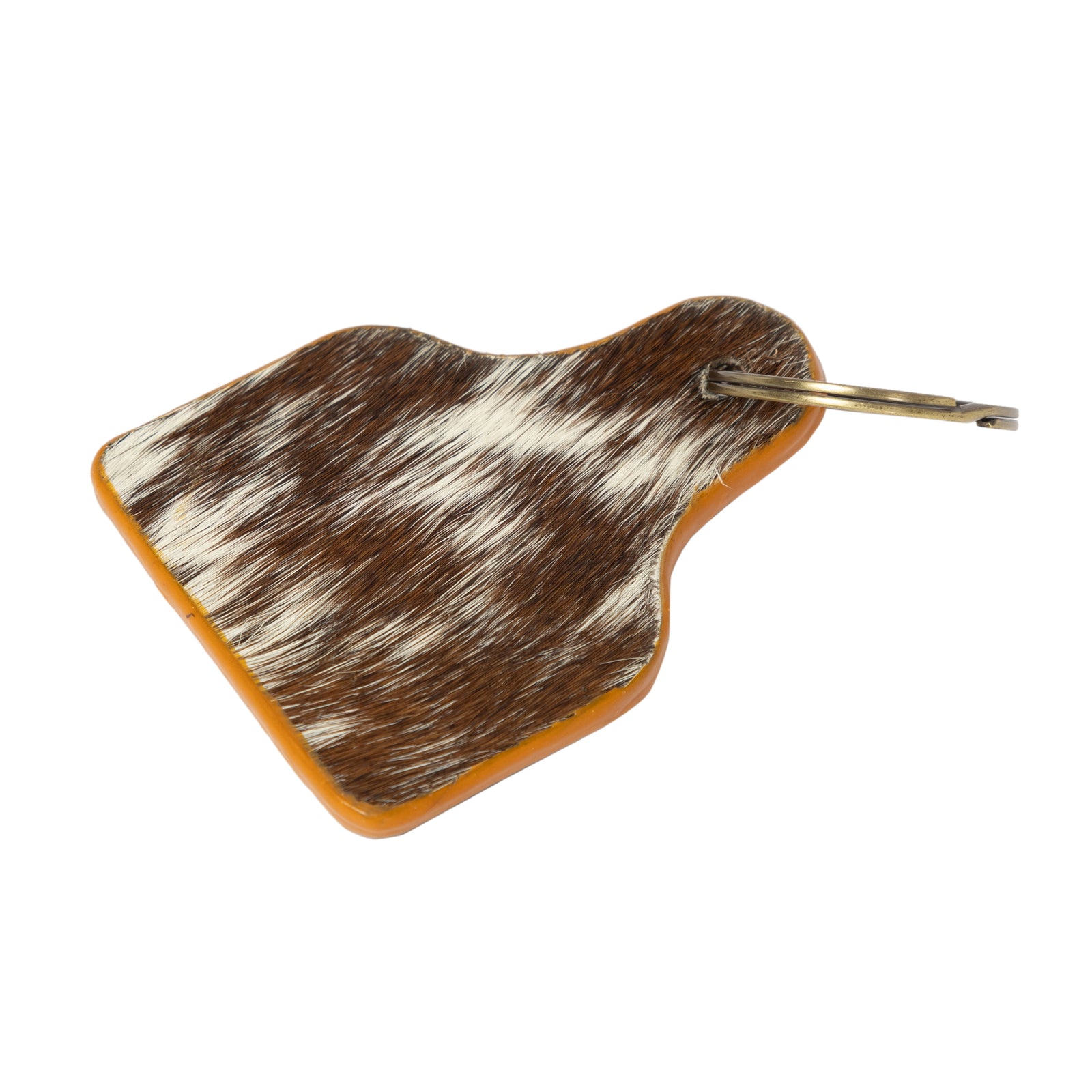 Keychain with brown and white speckled pattern on a white background