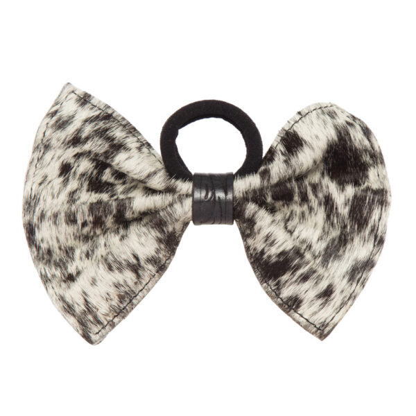 Women's Cowhide Leather Bow Hair Tie. A brown cowhide leather hair tie with a bow shape and a branded ring in the center.