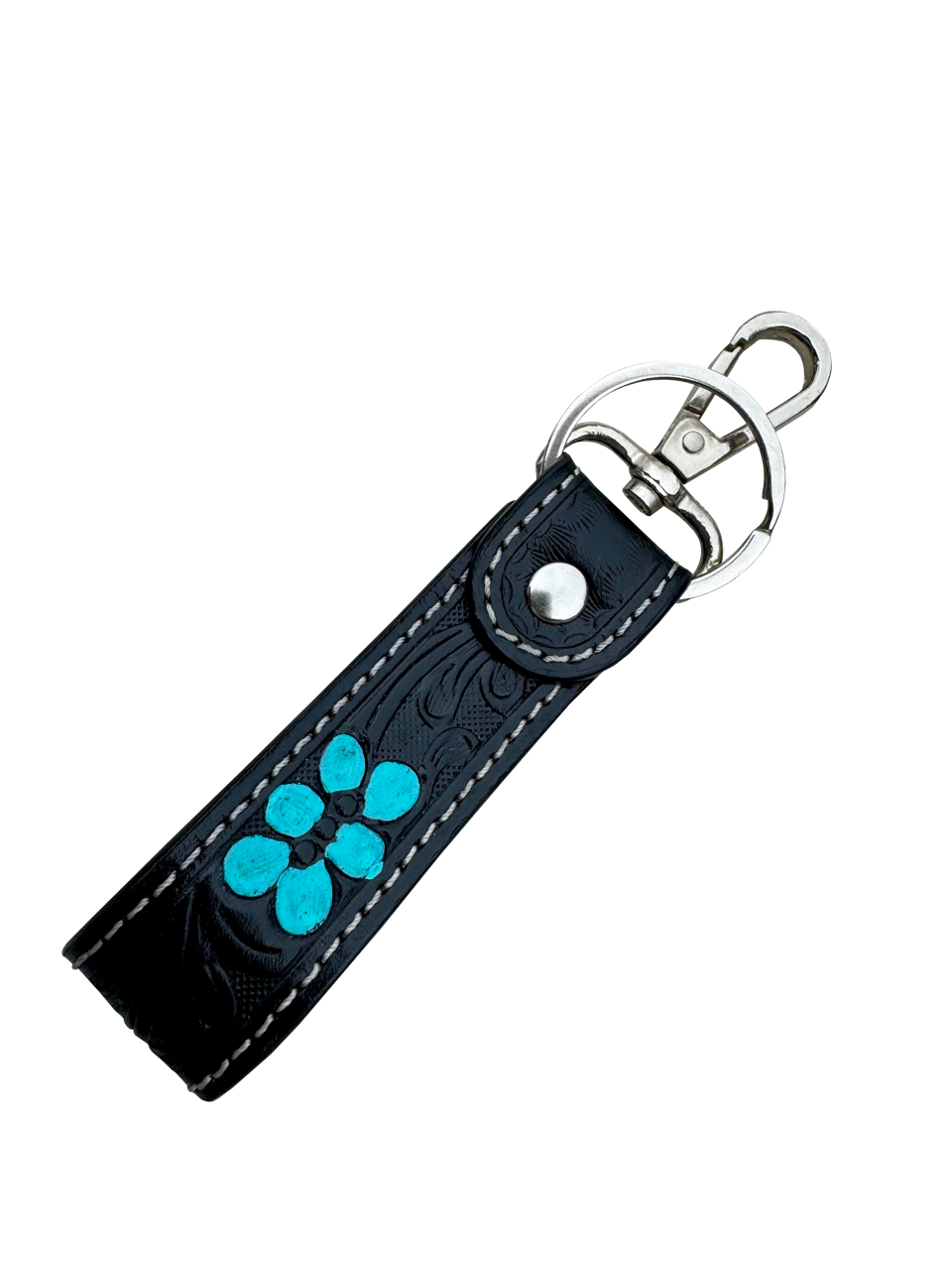 Tooling Leather and Cowhide Sleek Keyring. Black leather keychain with blue floral design on a white background