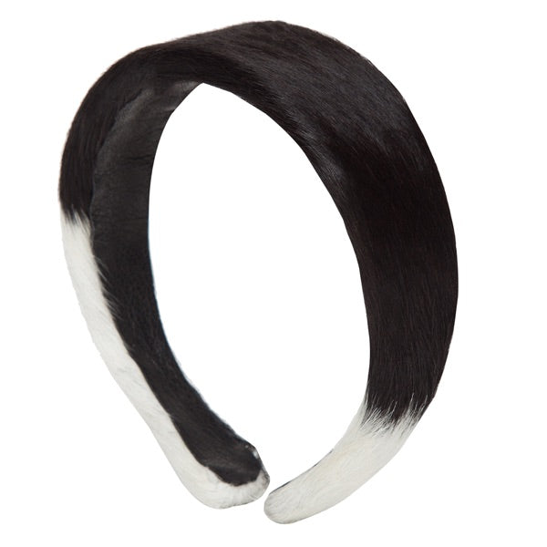 Cowhide Hairband. Brown and white hairband on a white background
