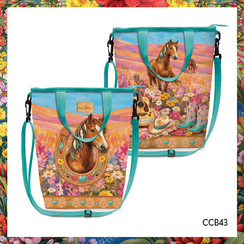 Two tote bags with turquoise straps and a western-themed horse illustration, shown on a white background with a colorful floral border. The bags feature a brown horse, flowers, a guitar, boots, and a horseshoe motif.