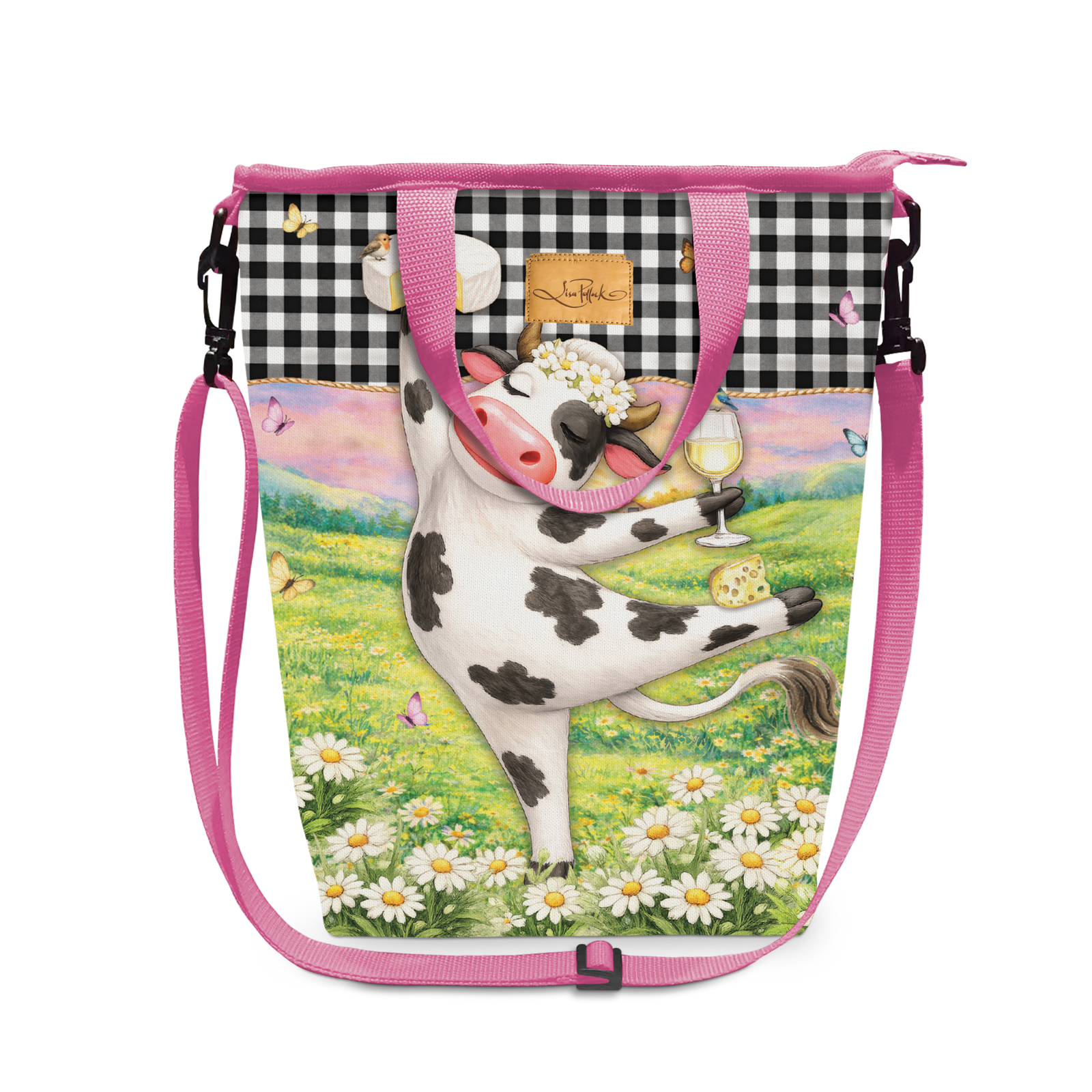 A drawstring shoulder bag with a vibrant illustration of a cow in a field of daisies, featuring a black and white gingham pattern on the upper section and a pink strap.
