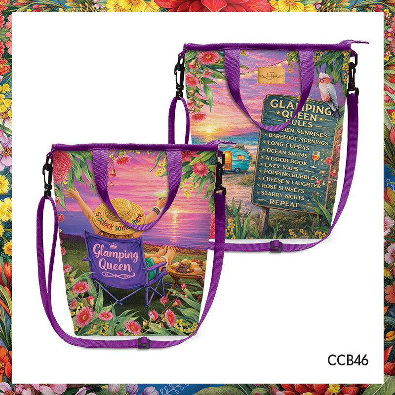 Two tote bags with purple handles and straps, featuring a colorful tropical beach scene with a sunset, palm tree, flowers, and a sign reading 'GLAMING QUEEN RULES'.