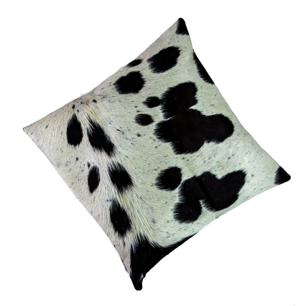 Brigalow Cowhide Cushion Cover. A square cowhide cushion cover with a black and white spotted pattern on a white background.