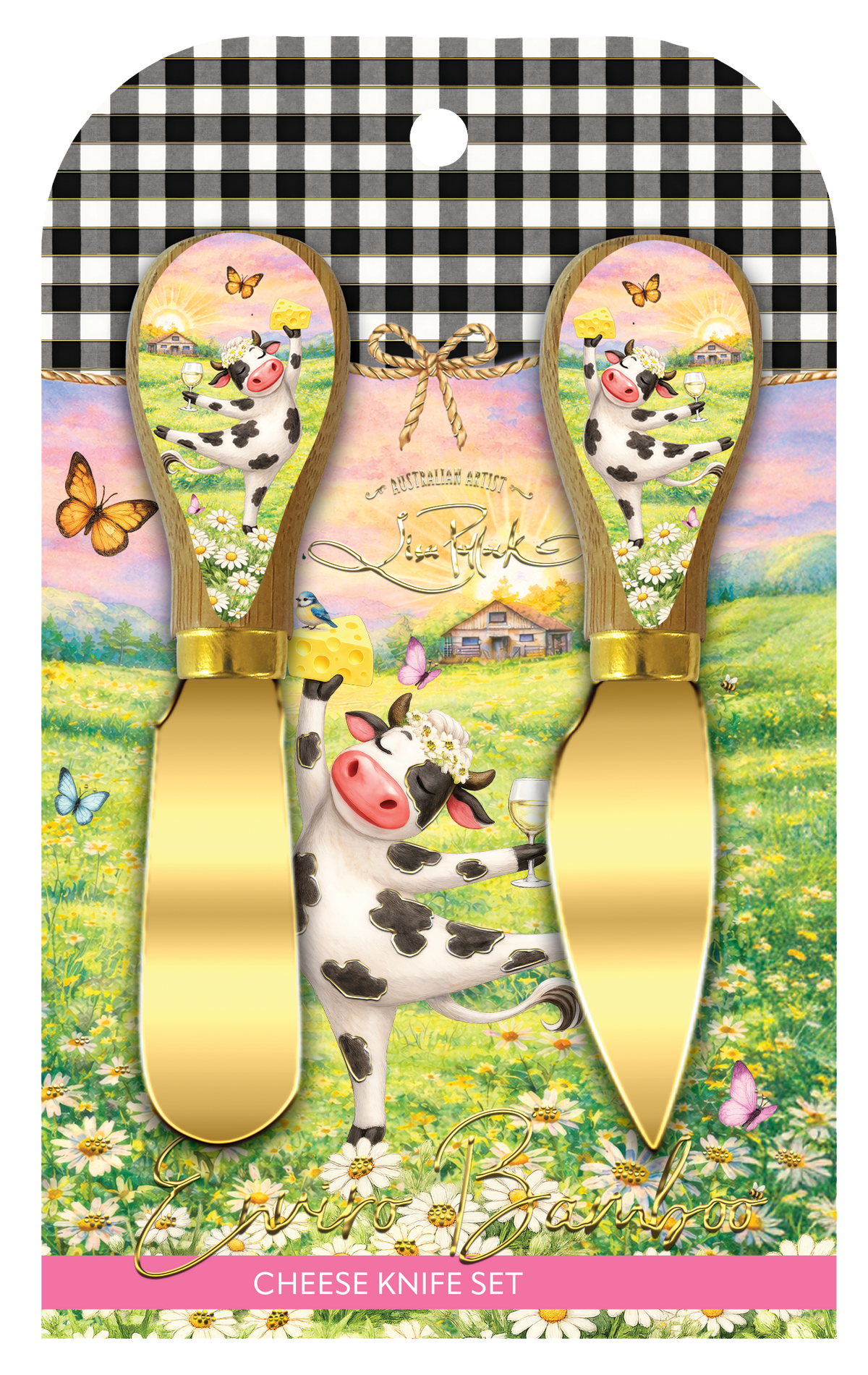 A decorative cheese knife set in retail packaging. The set includes two gold-colored cheese knives with handles featuring a whimsical cow illustration in a flower field, mounted on a printed backing card with a black-and-white gingham top and a pink 'CHEESE KNIFE SET' label at the bottom.