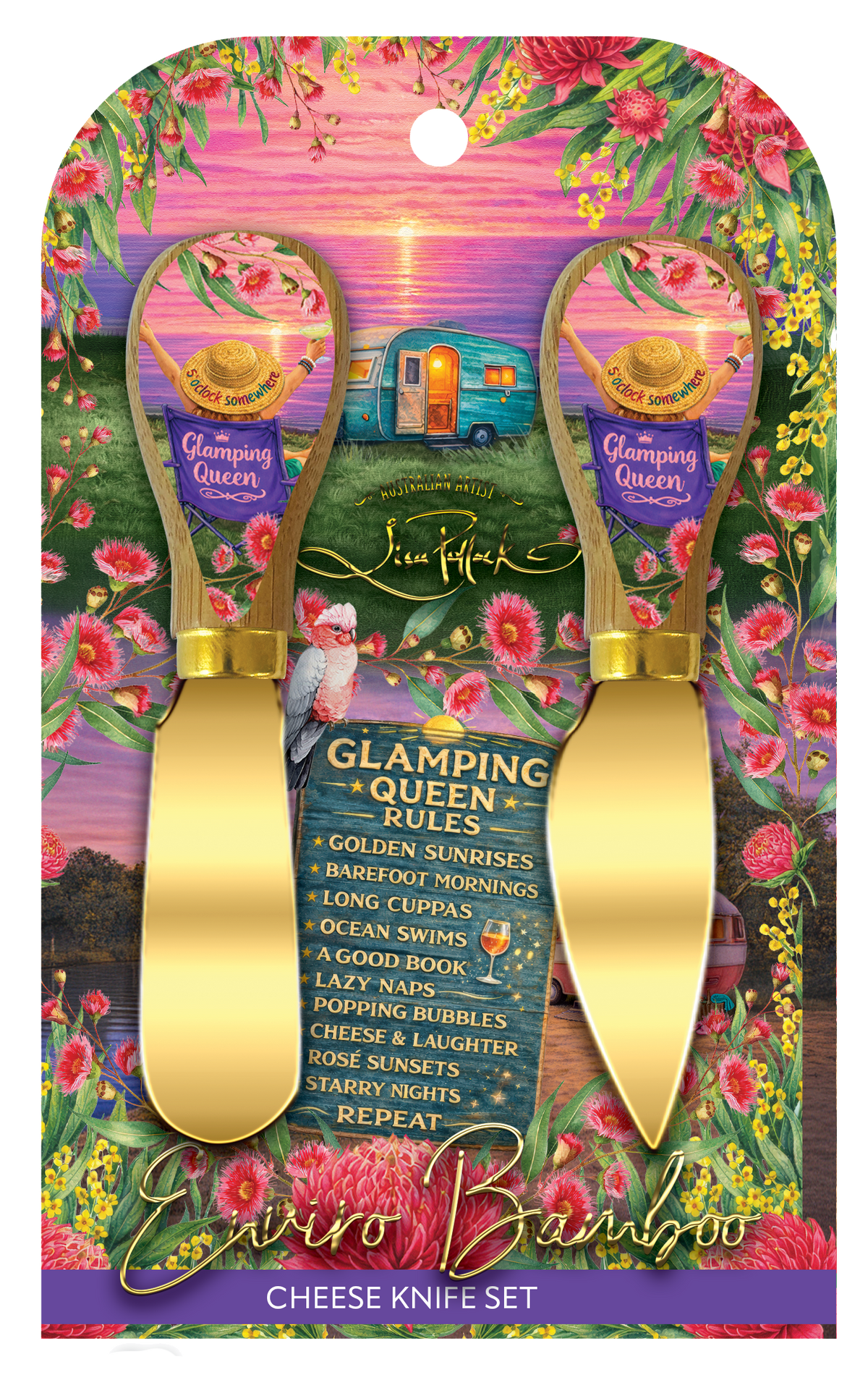 Jim Hall Envy Bamboo Cheese Knife Set in a tropical floral carded packaging. The set features two gold cheese knives with purple handles decorated with a colorful sunset cabin illustration and the 'Glamping Queen' title.
