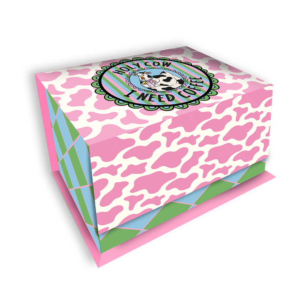 Pink cow print box with colorful design on a white background