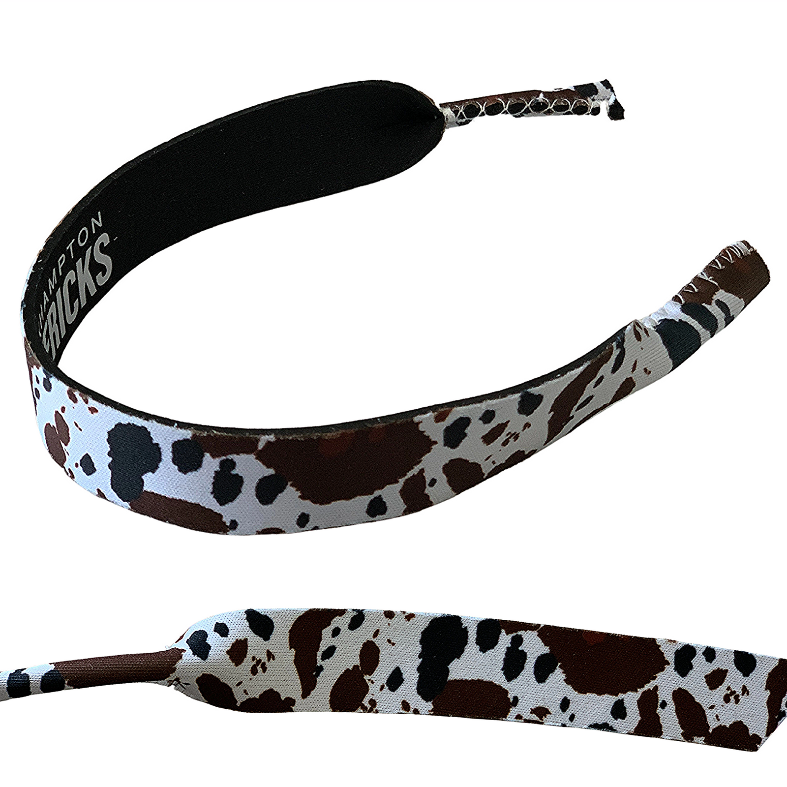 Rocky Mavericks Cool Cowhide Sunglasses Strap. A cowhide pattern sunglasses strap with the text 'ROCKY MAVERICKS' visible on the strap's material.