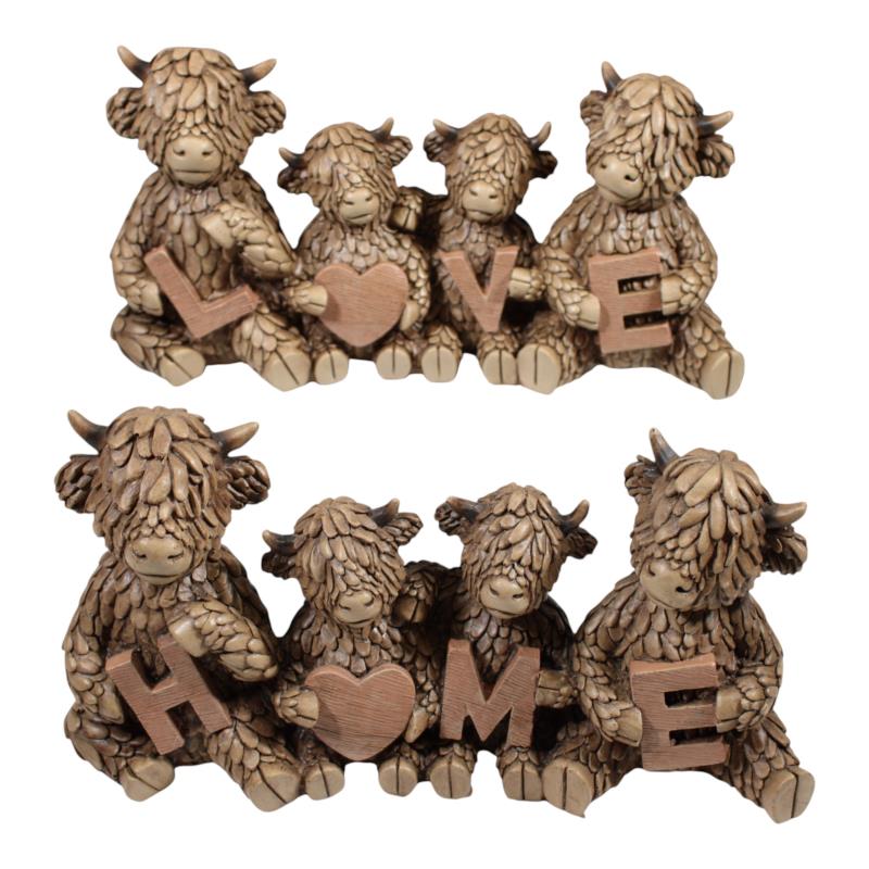 Decorative wall art with Highland cow figures spelling 'LOVE' and 'HOME'.