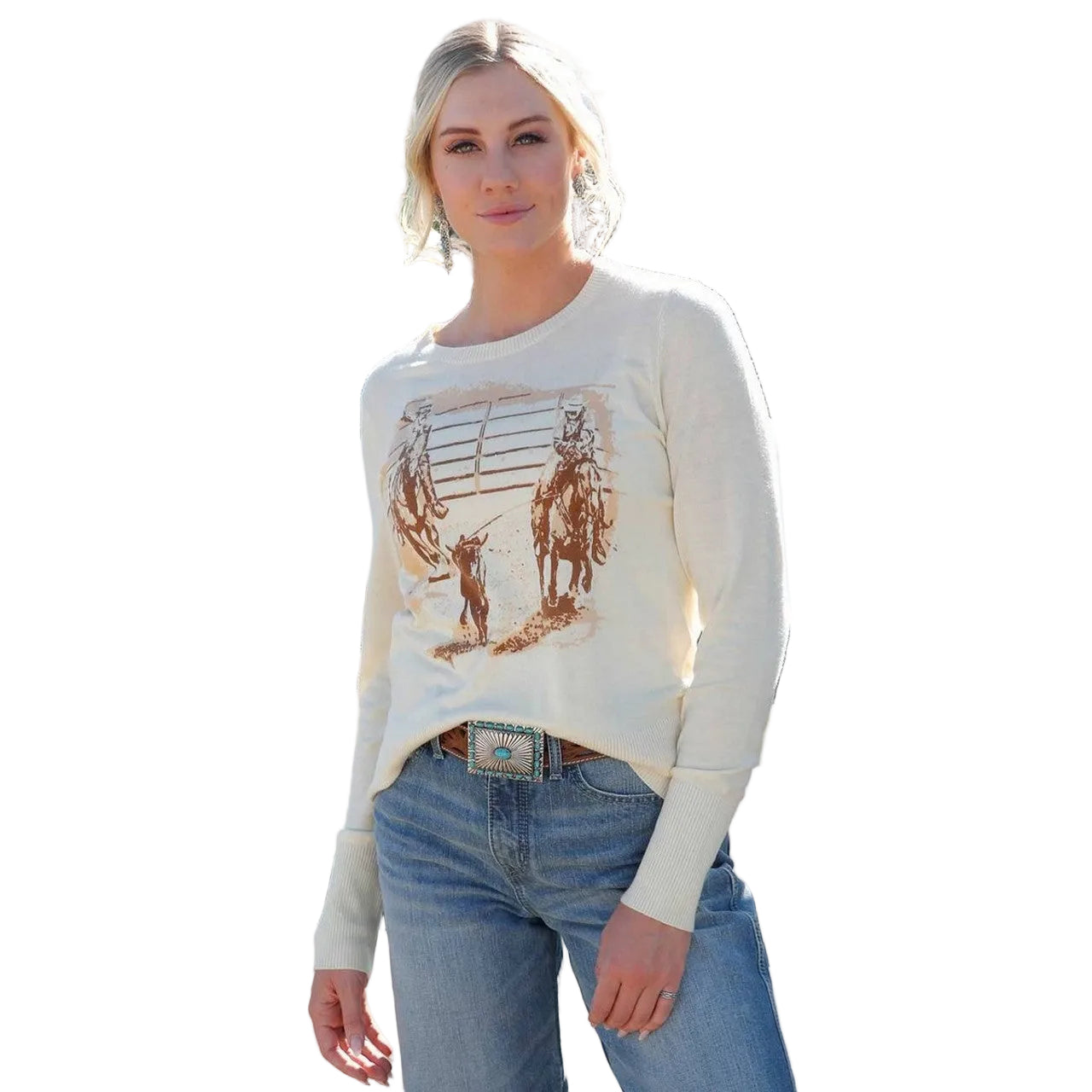 Cruel Denim Women's Roper Graphic Lightweight Sweater. Woman wearing a cream sweater with horse print outdoors