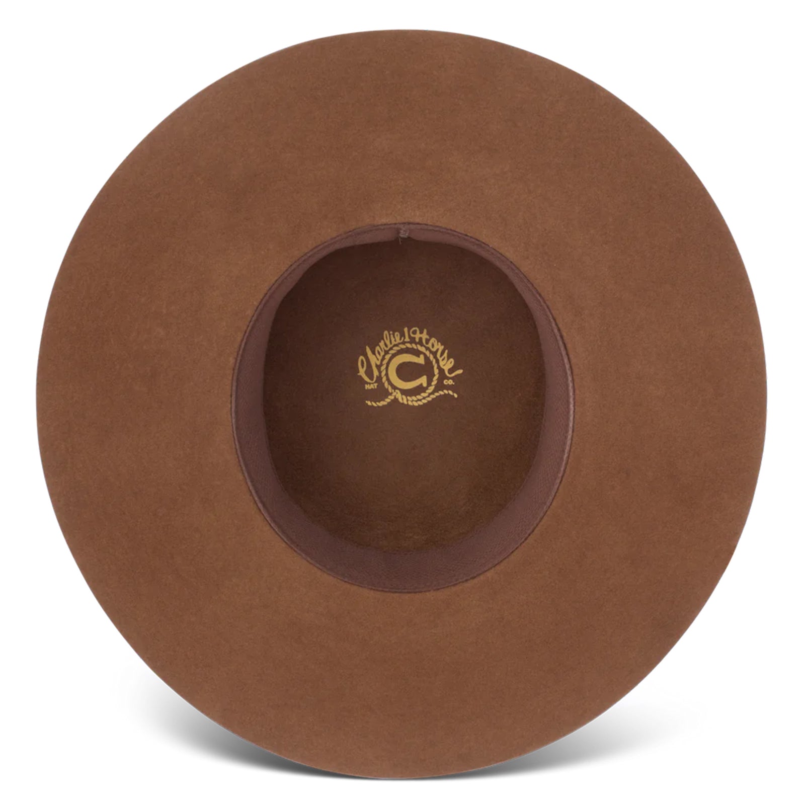 Charlie 1 Horse Wanderlust Felt Cowboy Hat. A brown wool cowboy hat with a bubble crown and a brim, featuring a woven hatband with a silver side concho and a small feather, and the Charlie 1 Horse brand logo on the crown.