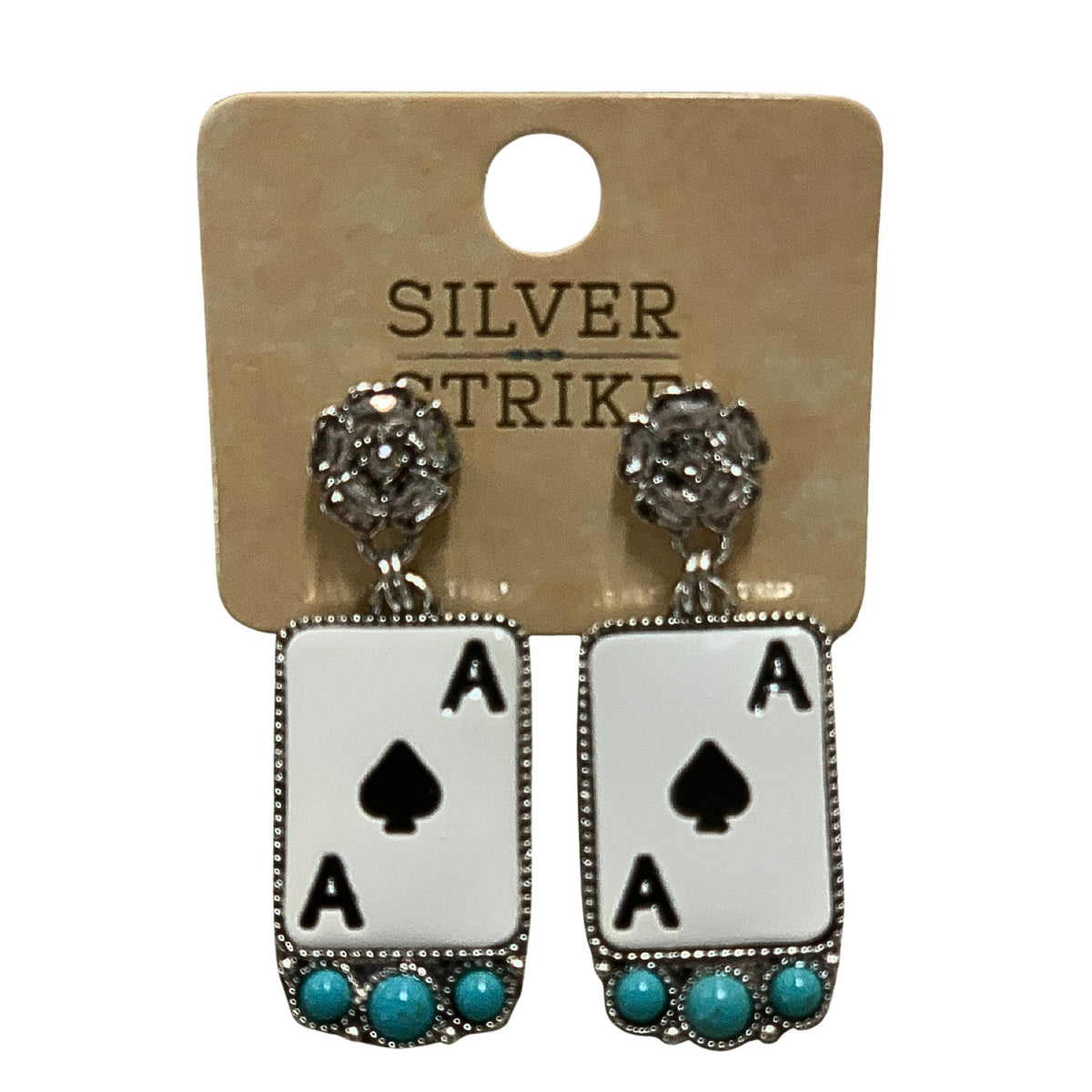 Pair of earrings with 'Ace of Spades' design on a 'Silver Strike' branded card.