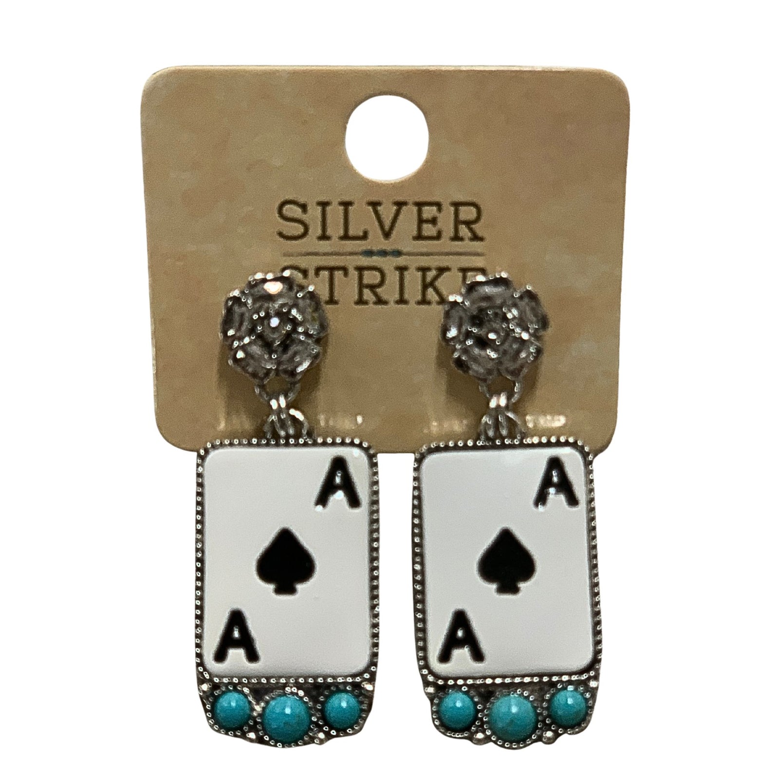 Pair of earrings with 'Ace of Spades' design on a 'Silver Strike' branded card.