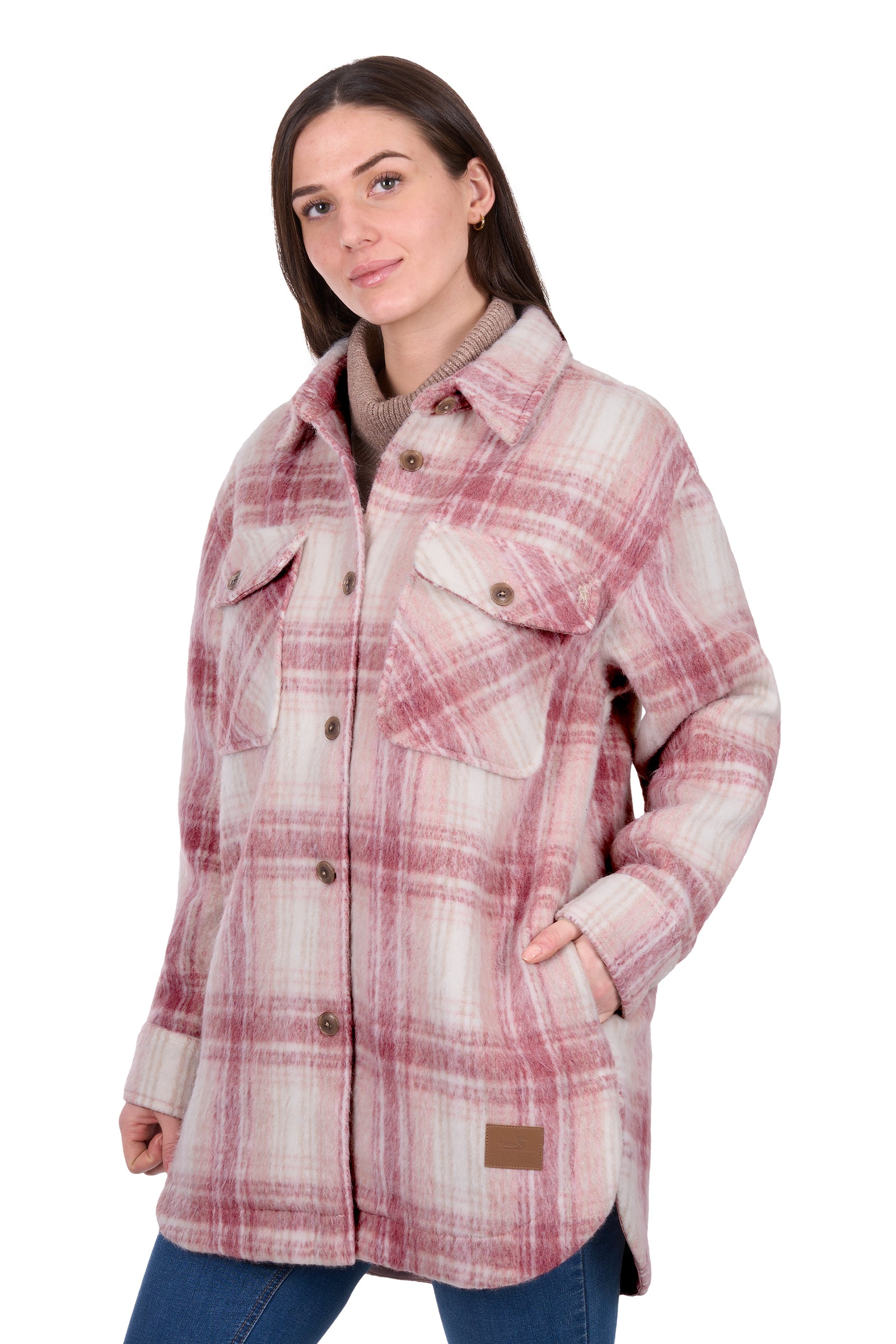 Woman wearing a plaid jacket on a white background
