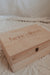 Here And Then Box - Natural. Wooden box with engraved text on a textured surface