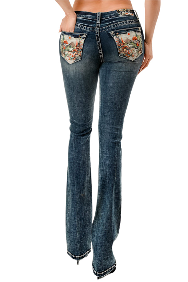 Grace In LA Women's Embroidered Scene Pocket Jean. Flared jeans with floral pocket designs on a white background