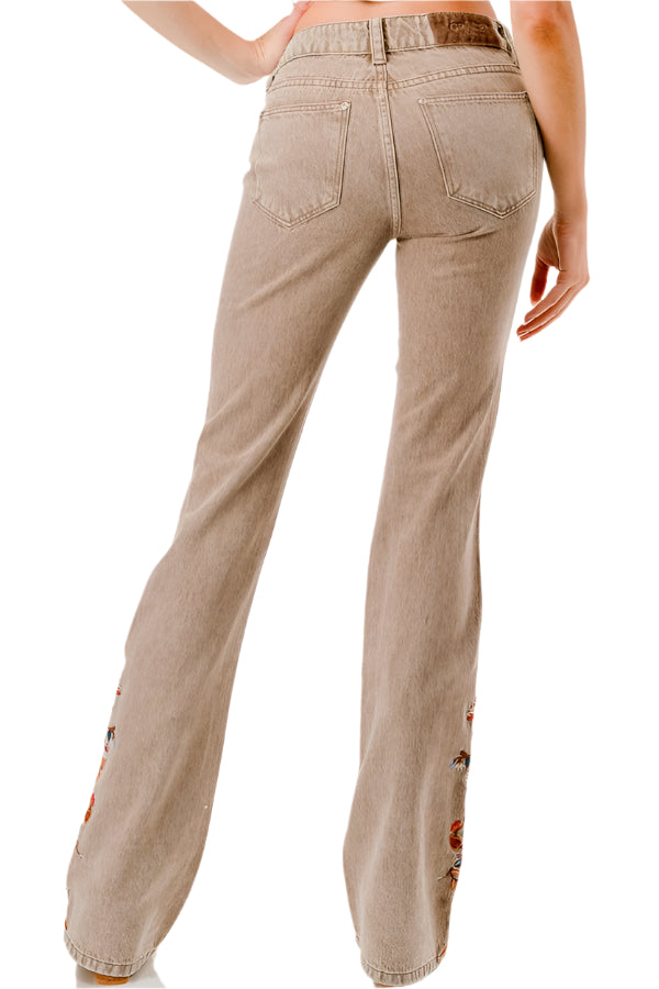 Grace In LA Women's Easy Fit Trouser. Beige jeans with floral embroidery on a white background