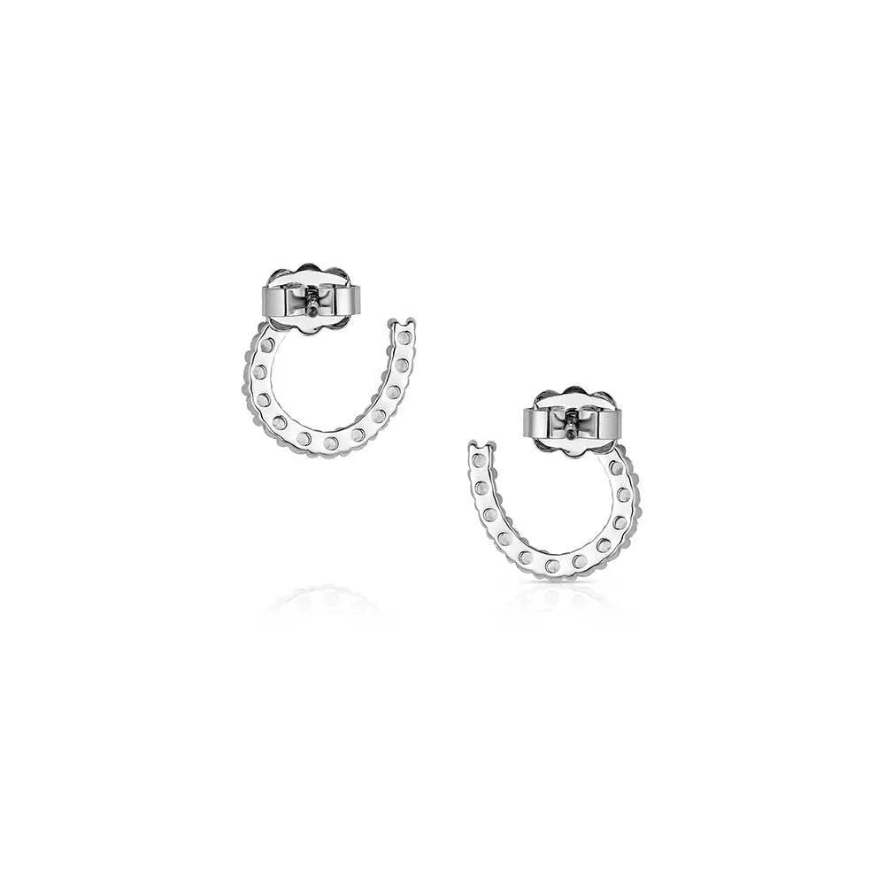 Montana Silversmiths Tiny Rider Post Earrings. Pair of silver hoop earrings with small round stones on a white background