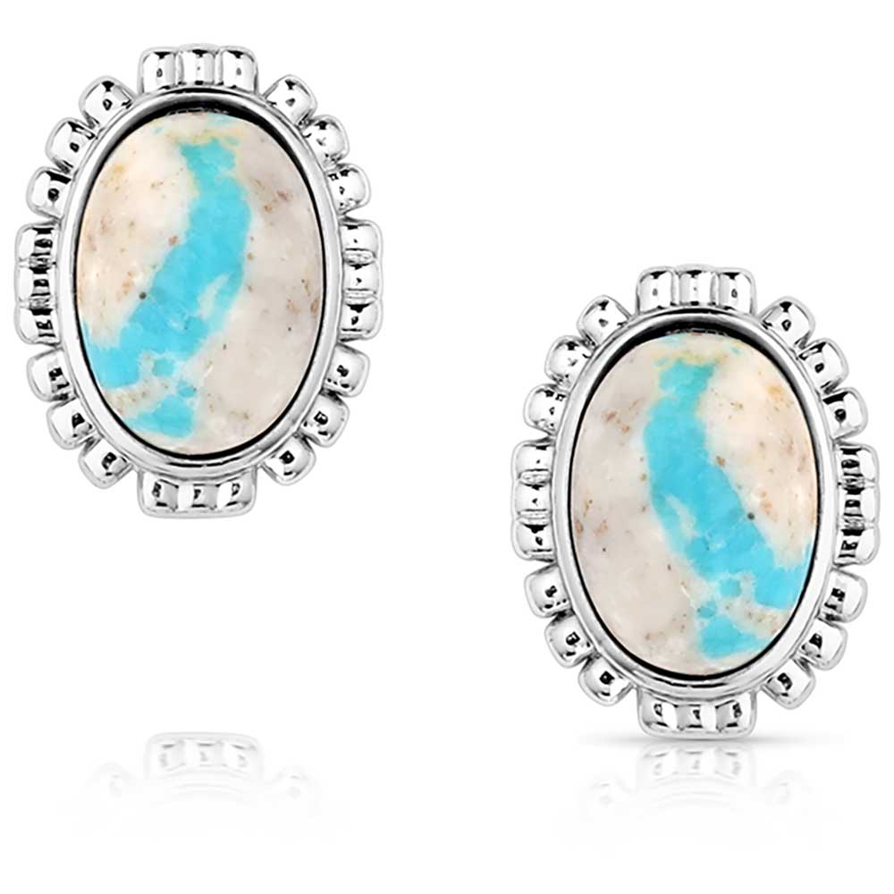 Montana Silversmiths Heavenly Panorama Earrings. A pair of Montana Silversmiths Heavenly Panorama Earrings with silver tone beaded edge and turquoise stone pendant.