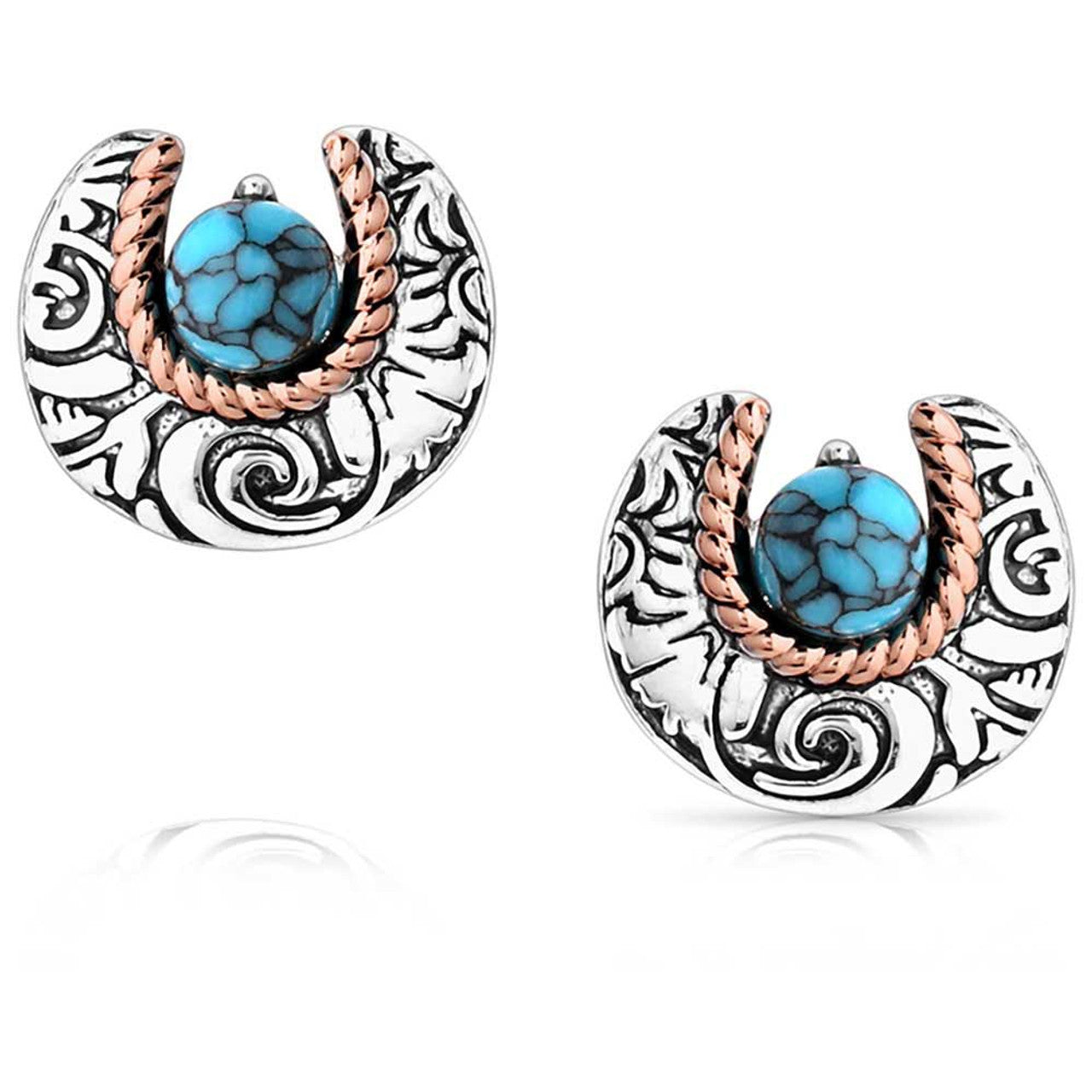 Montana Silversmith Luck of the Pure Earrings. A pair of earrings featuring a silver-tone horseshoe design with a turquoise stone inside and copper-tone rope detail on the inside of the horseshoe.