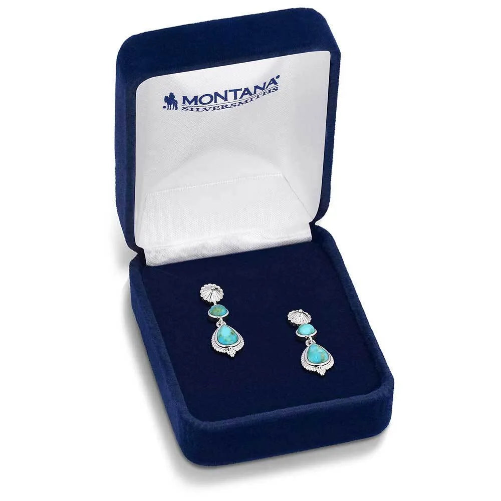 Montana Silversmiths Desert Bloom Earrings. Turquoise and silver earrings in a Montana Silversmiths box on a white background