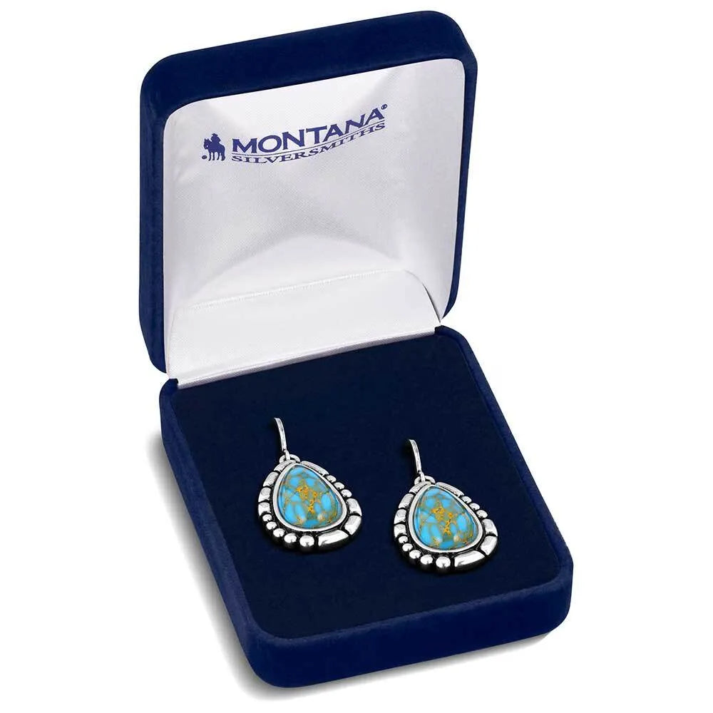Montana Silversmith Prickly Pear Turquoise Earrings. Turquoise teardrop earrings with silver accents in a Montana Silversmiths box.