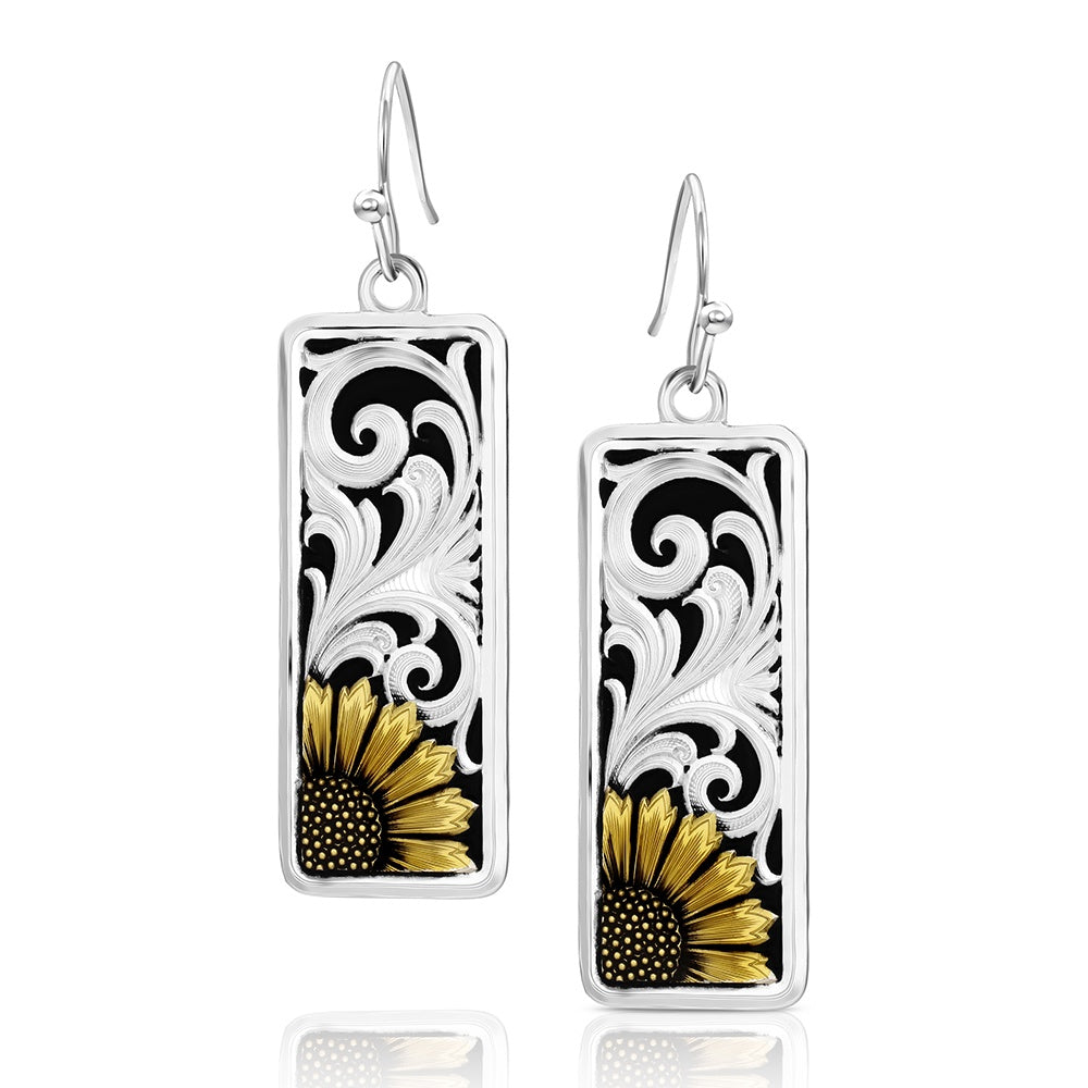 Rectangular earrings with sunflower design and black and white patterns on a white background