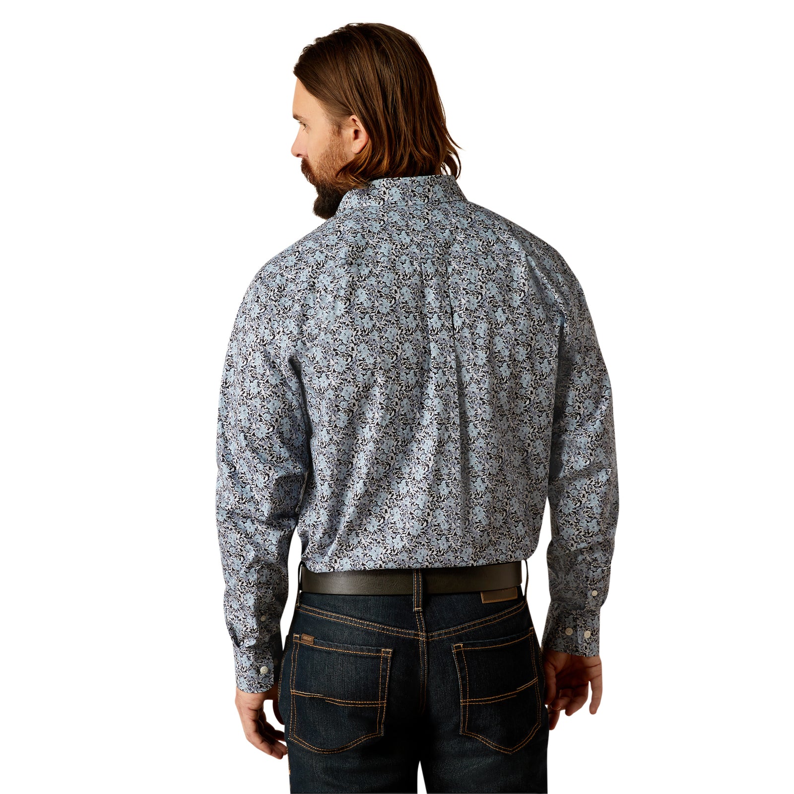 Ariat Men's Link Wrinkle Free L/S Western Shirt. A man wearing a long-sleeved Ariat Western shirt with a geometric pattern, button-up collar, and buttoned front.