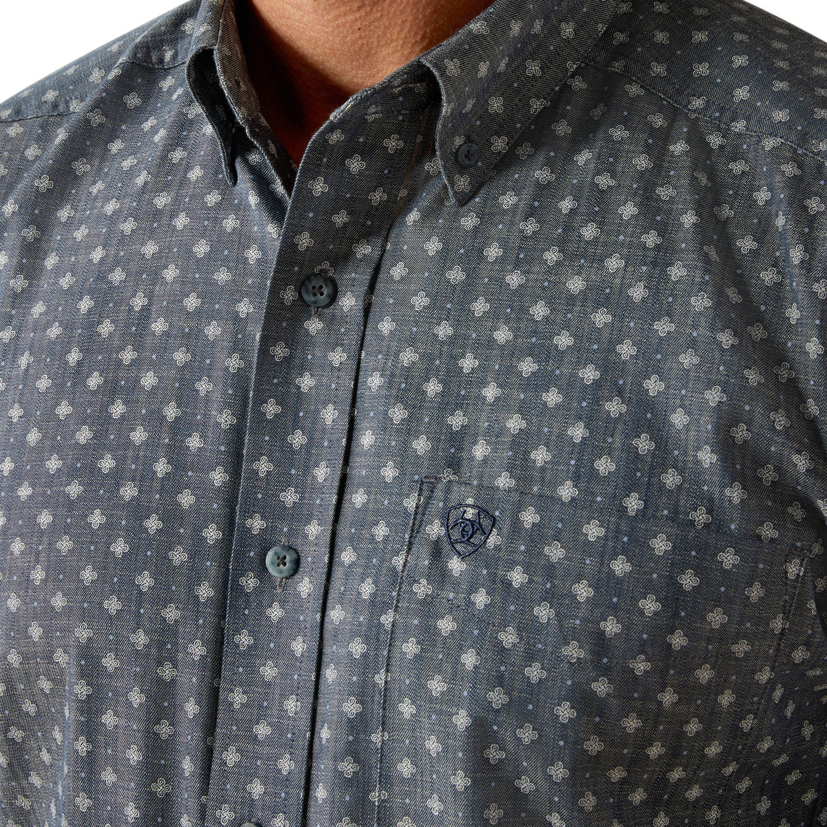 Ariat Men's Chip L/S Western Shirt. Close-up of a dark blue shirt with subtle pattern.