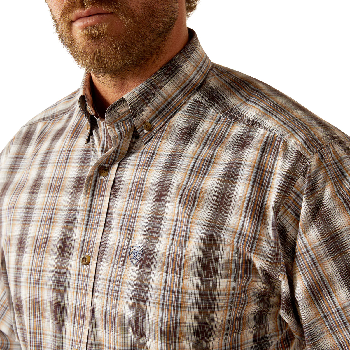 Ariat Men's Pro Series Casen L/S Western Shirt. Close-up of a plaid shirt worn by a person.