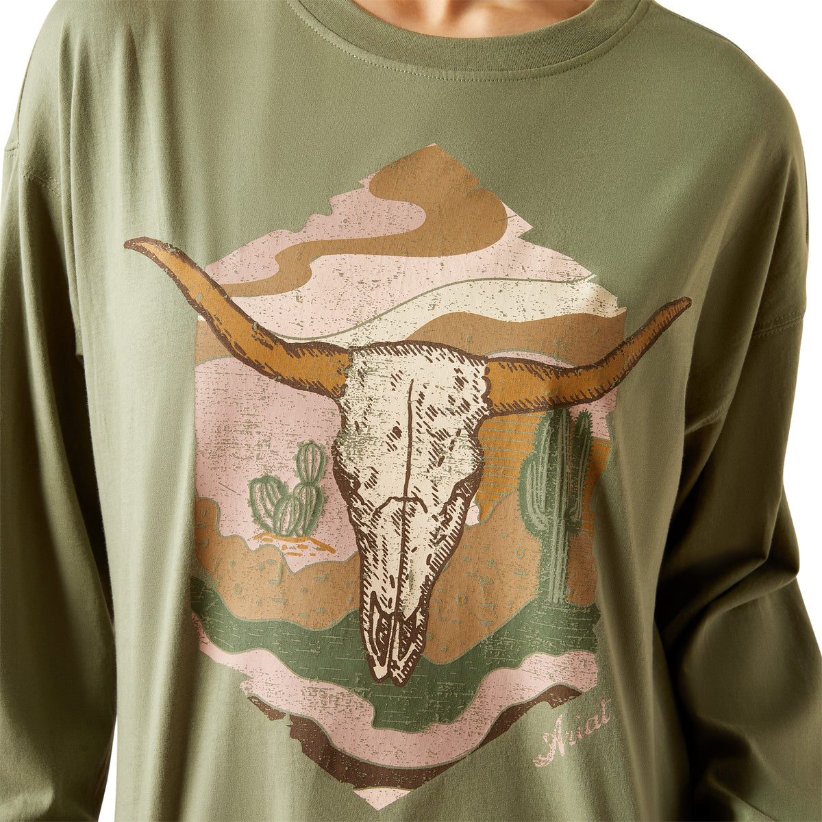 Ariat Women's Wanderer L/S T-Shirt. Olive green shirt with bull skull and cactus design.