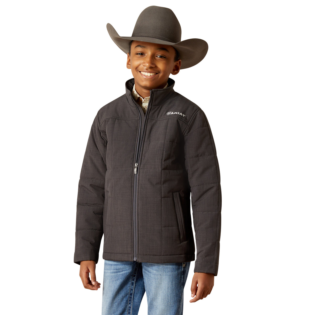 Child wearing a dark gray jacket and cowboy hat on a white background