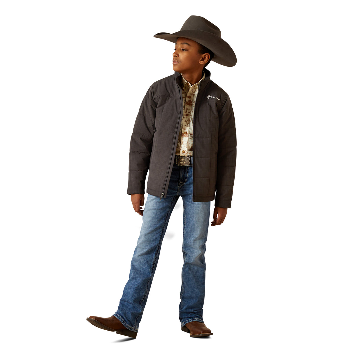 Child wearing a brown jacket, blue jeans, and a cowboy hat on a white background