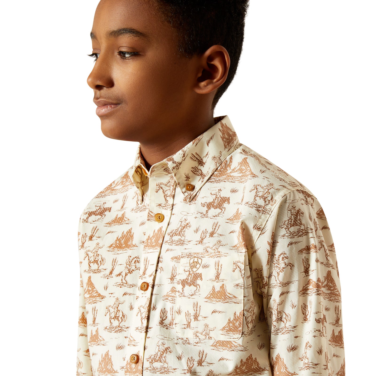 Child wearing a patterned shirt on a white background
