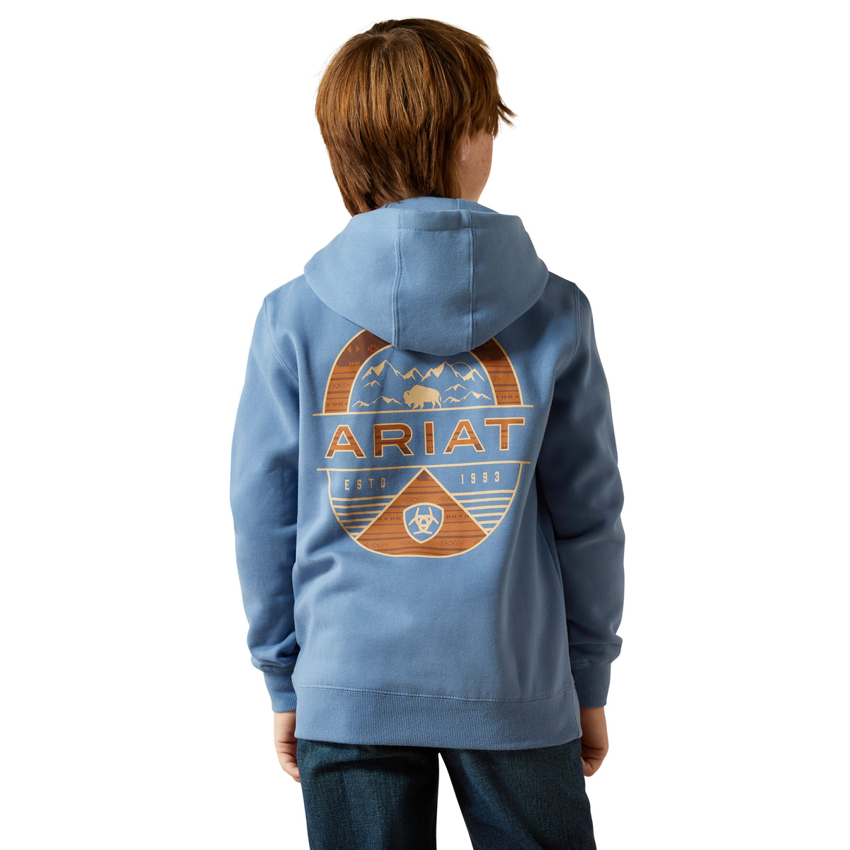 Child wearing a blue hoodie with Ariat logo on the back against a white background