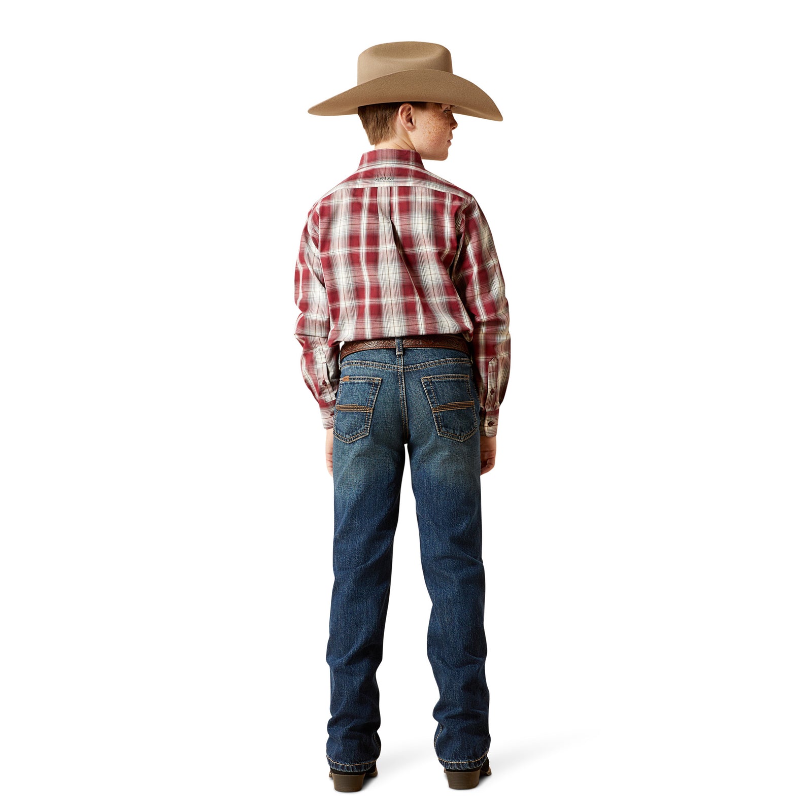 Person wearing blue jeans and a plaid shirt on a white background
