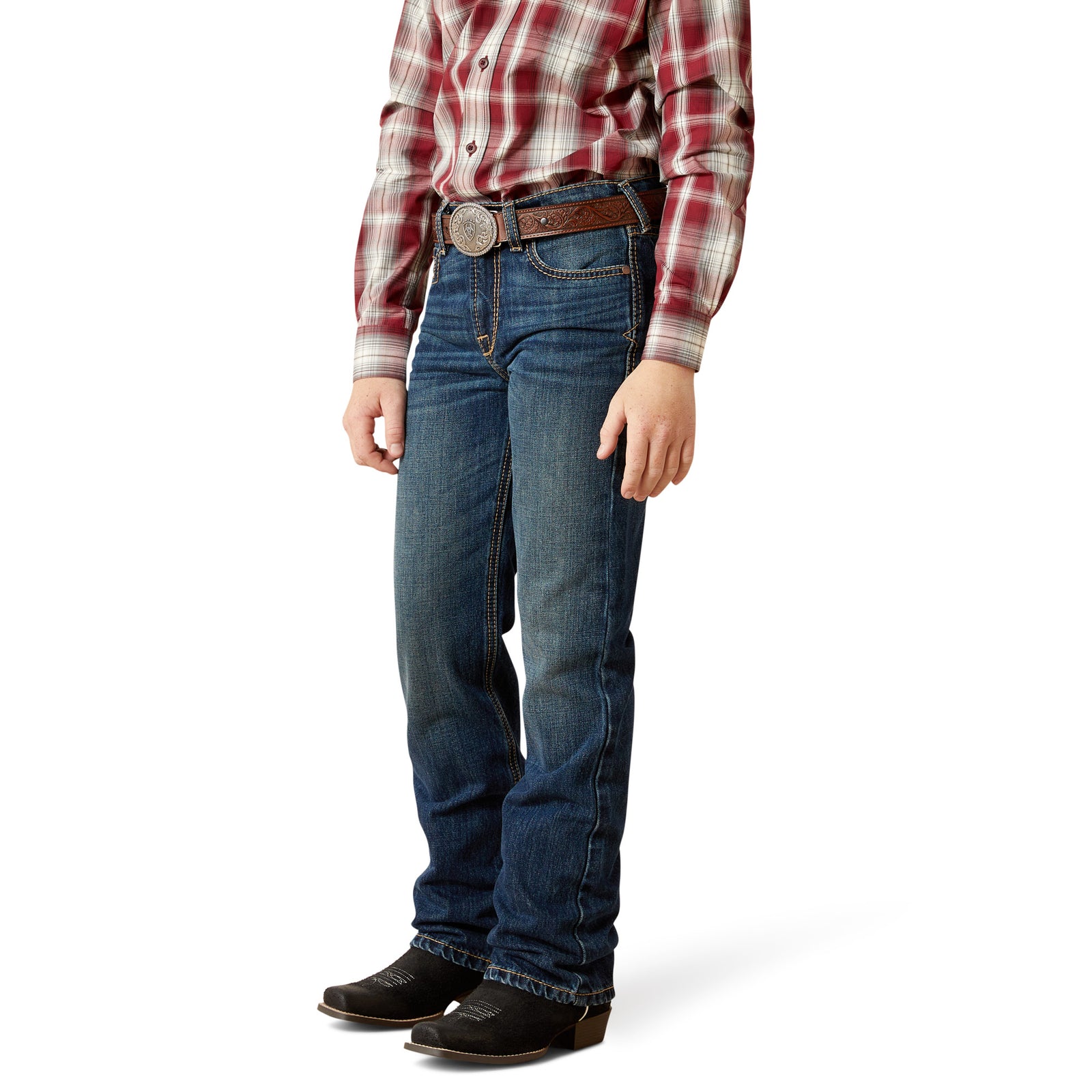 Person wearing blue jeans and a plaid shirt on a white background