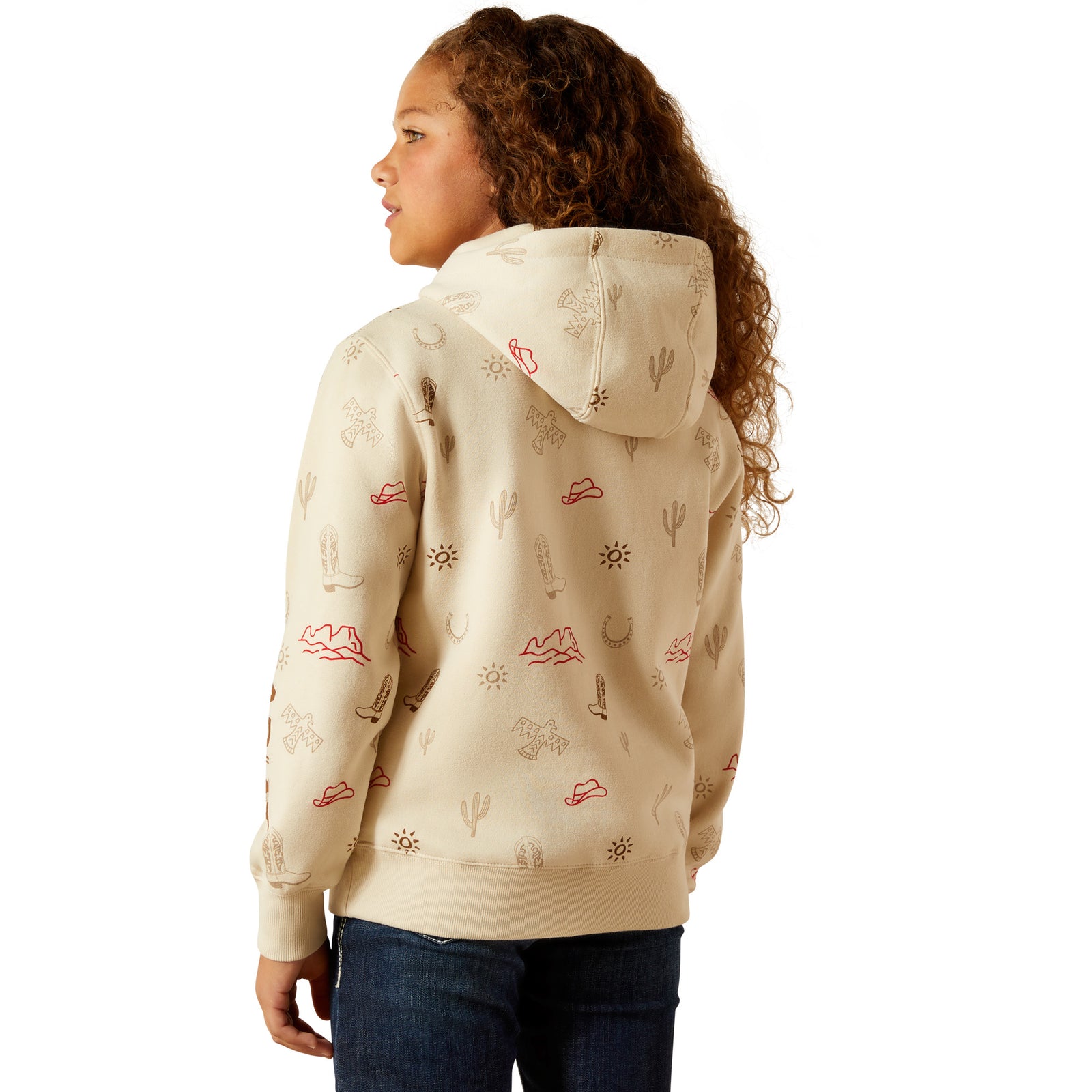 Person wearing a beige hoodie with desert-themed patterns on a white background
