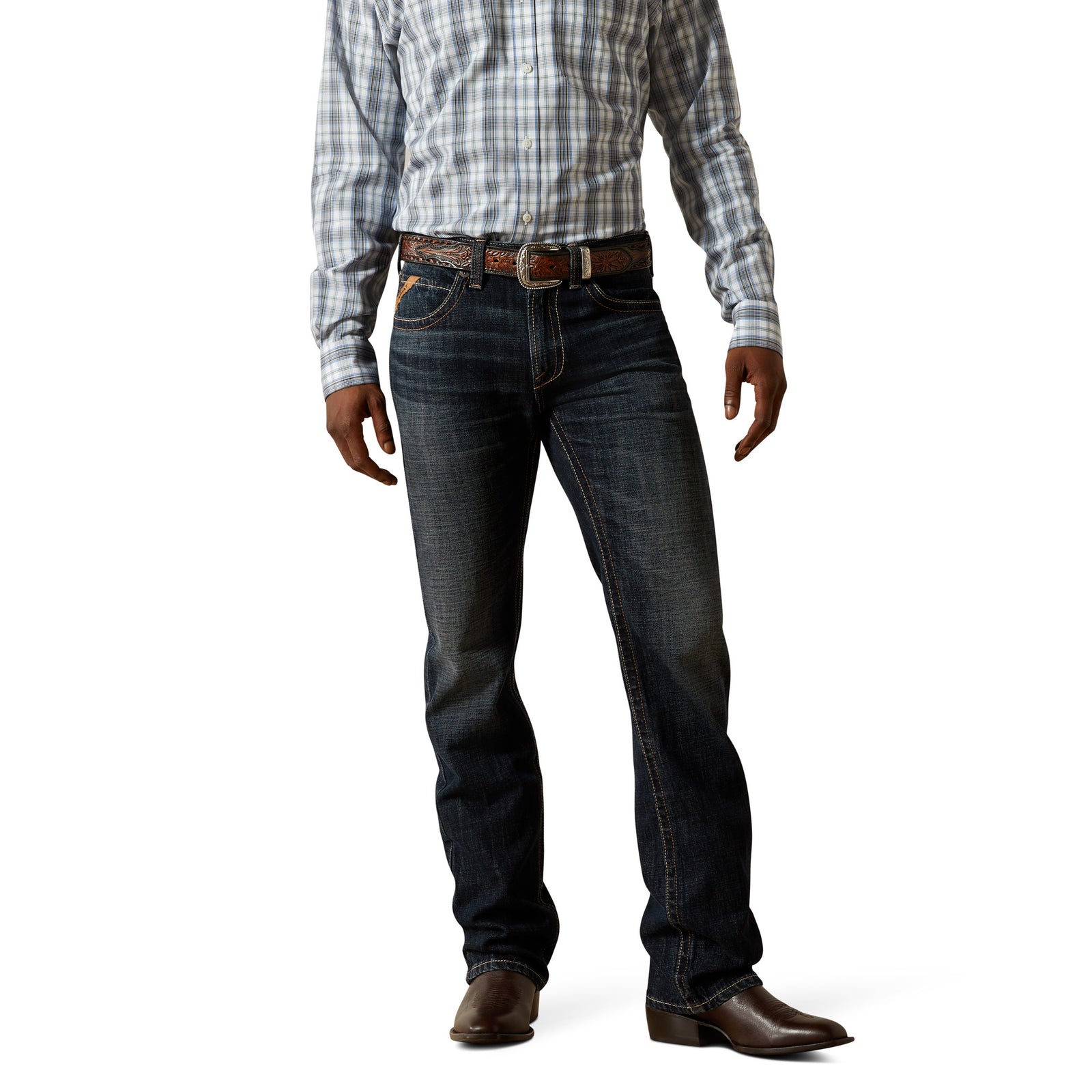 Ariat Men's M5 Keith Straight Leg Jean. Person wearing dark blue jeans and a plaid shirt on a white background